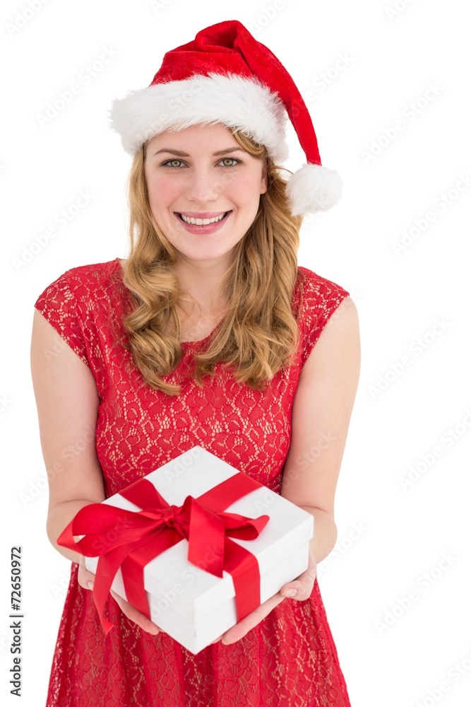 Smiling pretty woman in red dress offering present Smiling pretty woman in red dress offering present