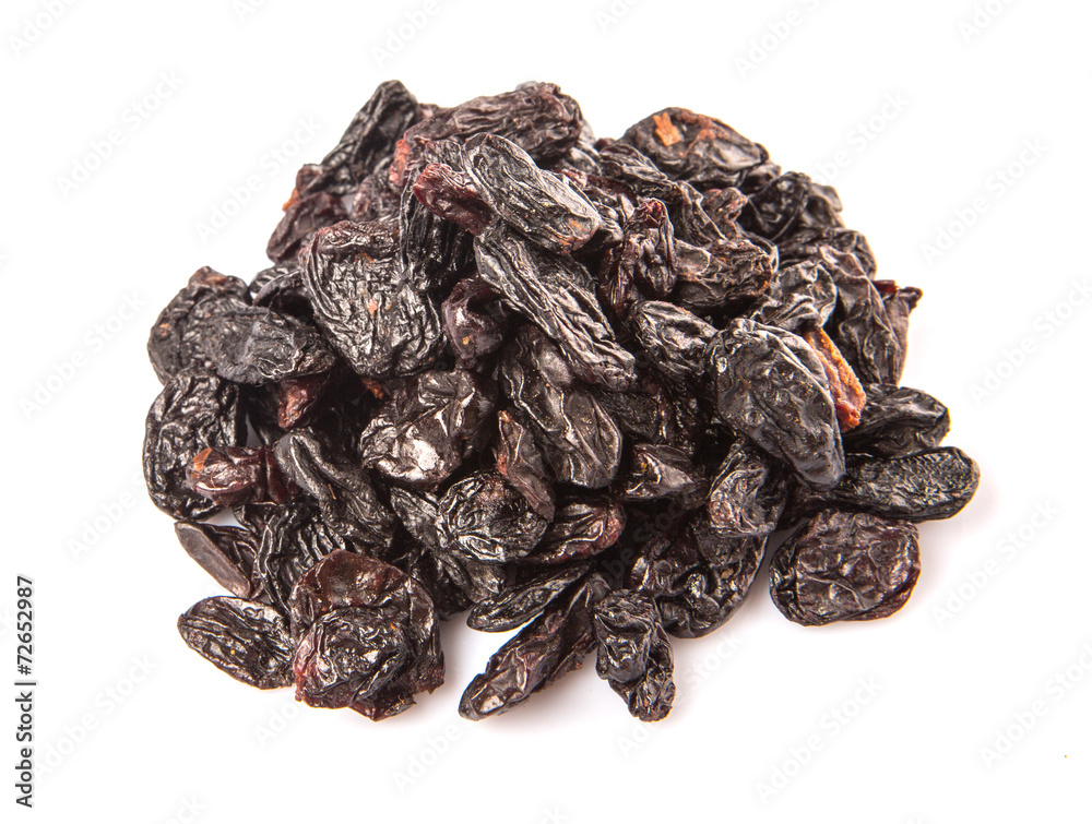Black raisin over white background Black raisin over white background