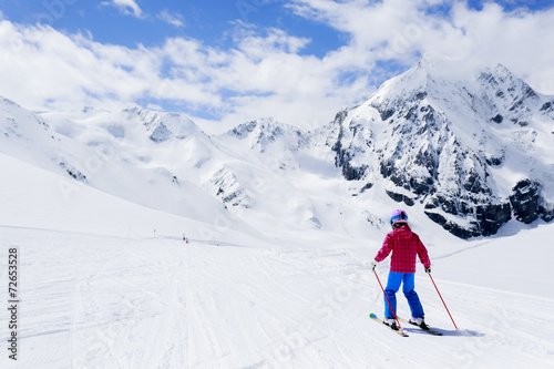  Skiing, downhill - skier on mountainside