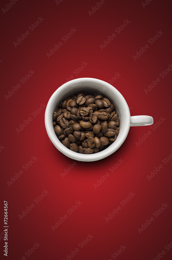 Obraz premium Grãos de Café na xícara