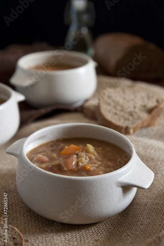 Fresh homemade beans soup with cabbage and carrots
