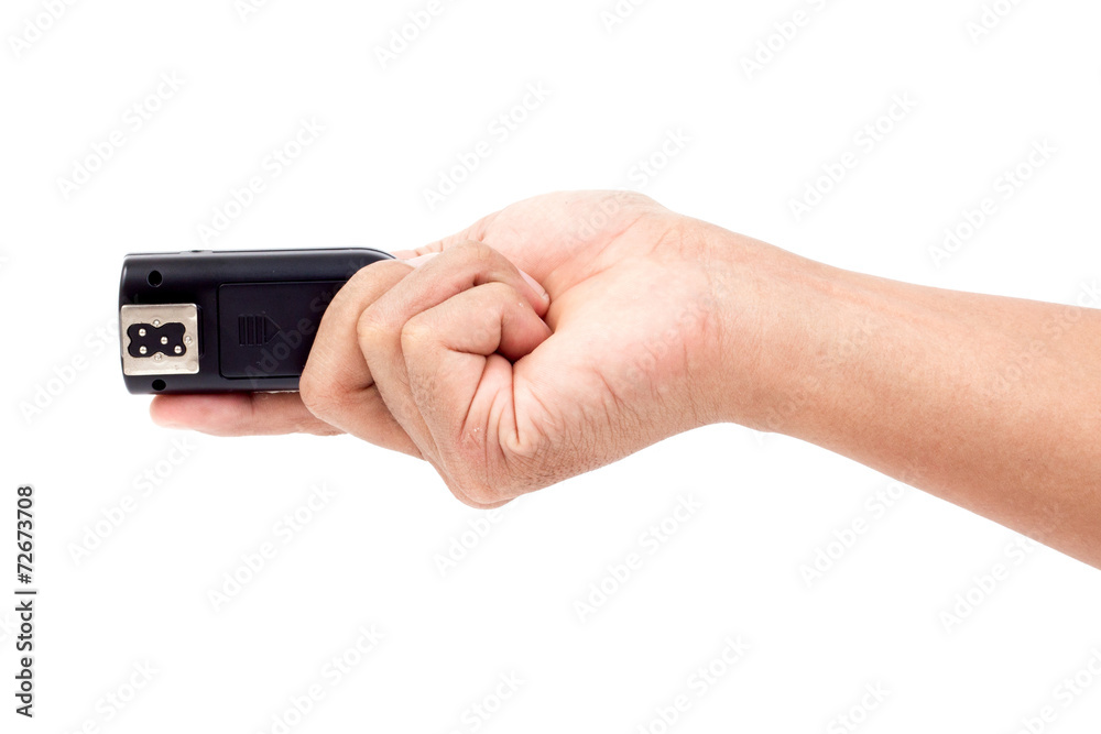 Wireless Flash Trigger in hand, Isolate on white background Wireless Flash Trigger in hand, Isolate on white background