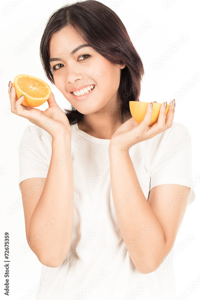 Young woman holding fresh oranges. Healthy eating. Isolated over Young woman holding fresh oranges. Healthy eating. Isolated over