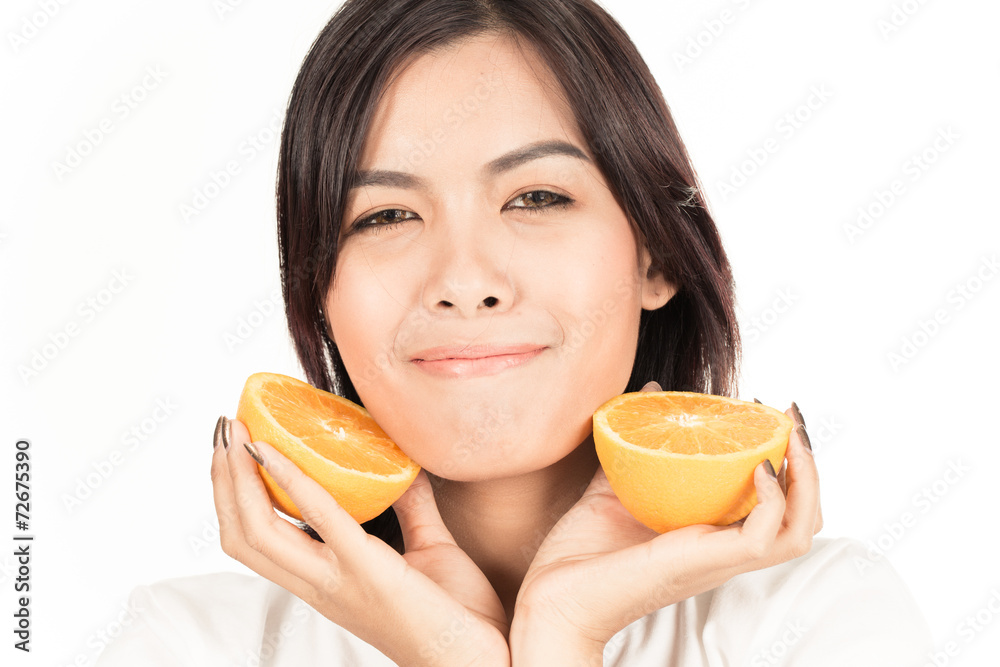 Young woman holding fresh oranges. Healthy eating. Isolated over Young woman holding fresh oranges. Healthy eating. Isolated over