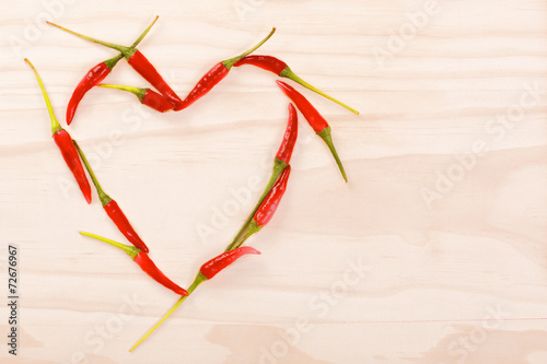 Red heart made of red hot chilli peppers