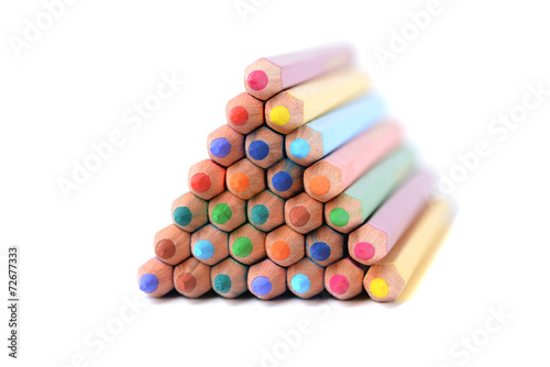 Pyramid of color pencils isolated over white