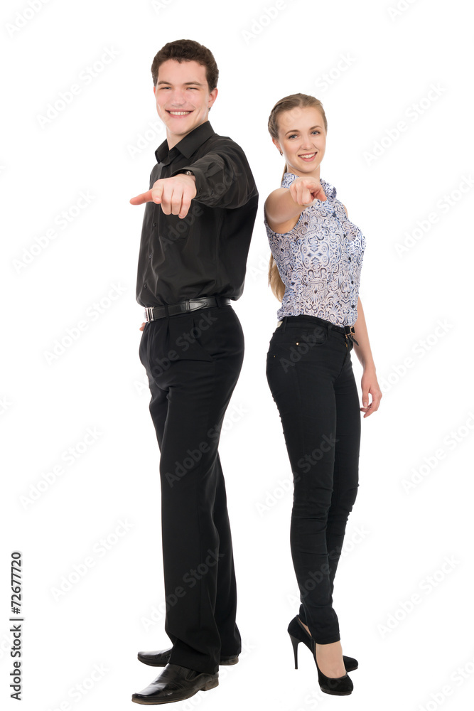 Business woman and man point finger at you looking at camera. Business woman and man point finger at you looking at camera.