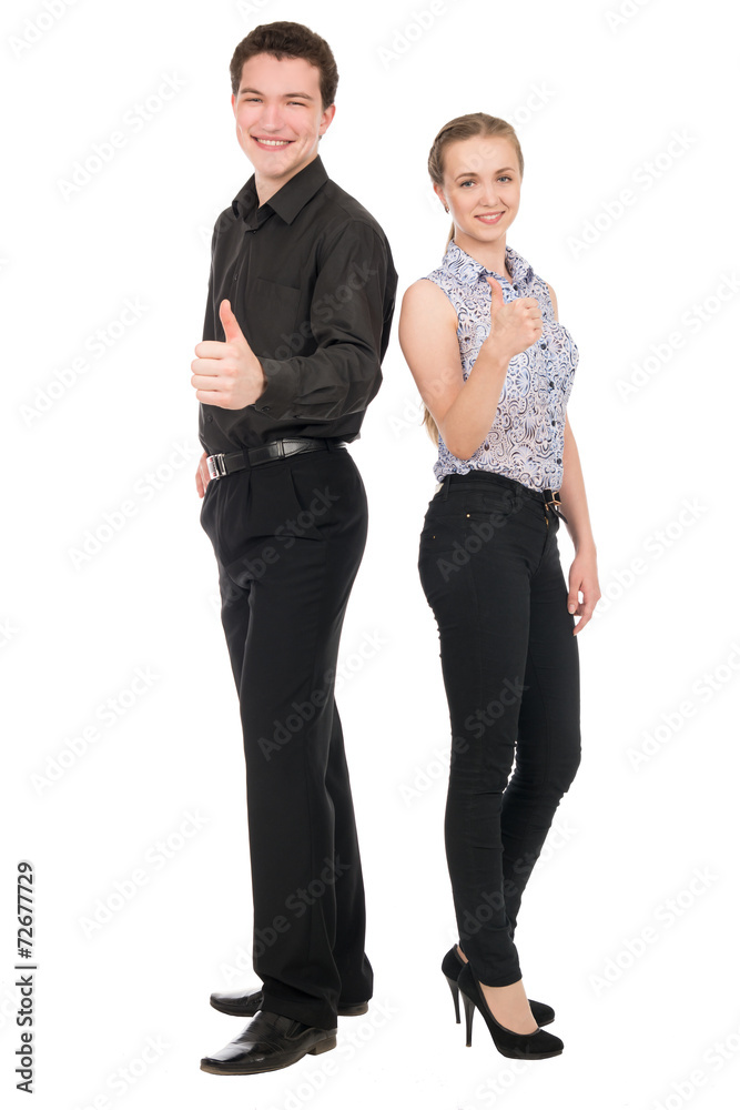 Side view portrait of happy couple showing thumbs up sign while Side view portrait of happy couple showing thumbs up sign while