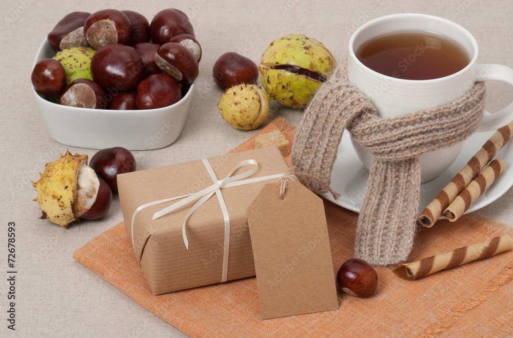 Gift Box With Blank Tag. Cup Of Hot Tea With Sweets. Chestnuts.