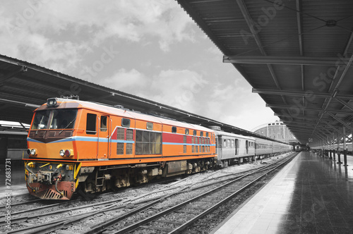 Orange train, black and white background