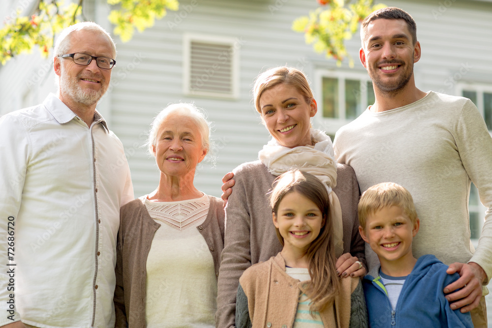 happy family in front of house outdoors happy family in front of house outdoors
