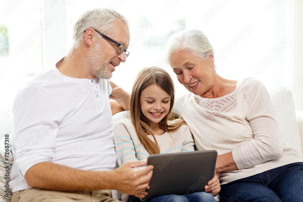 smiling family with tablet pc at home smiling family with tablet pc at home