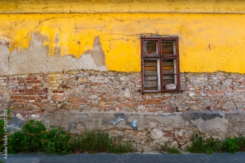 Ruined house with window