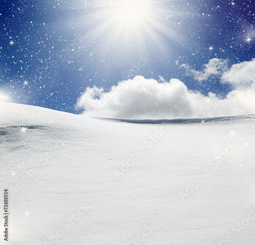 Background of cold winter landscape with snow, blue sky and sunl © Melinda Nagy
