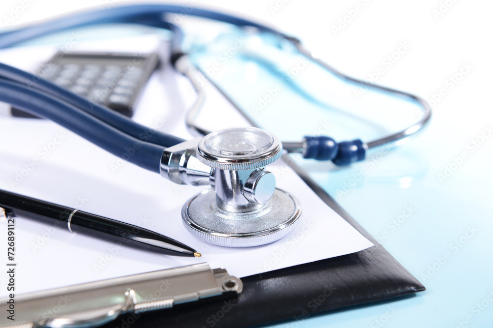 Stethoscope on light blue background Stethoscope on light blue background