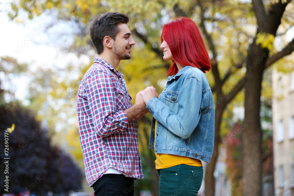 Fototapeta premium Loving couple in autumn park