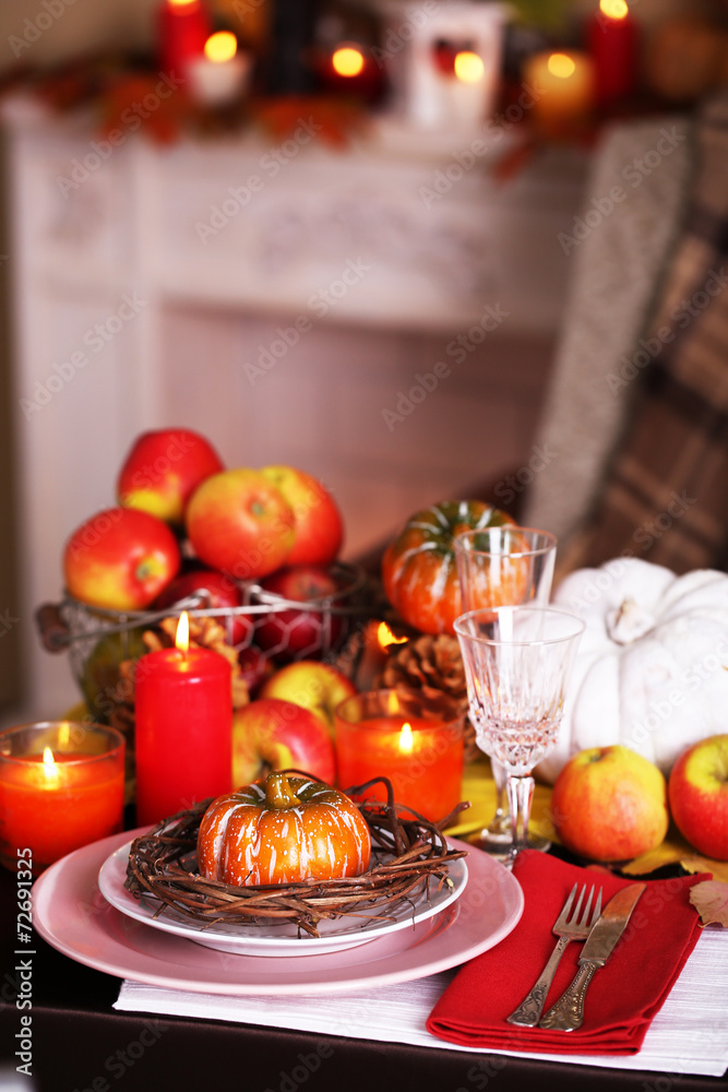 Festive autumn serving table in room Festive autumn serving table in room