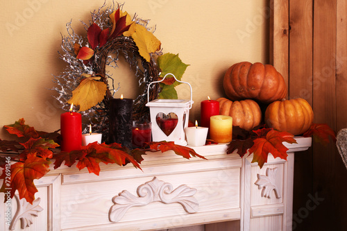 Fototapeta Naklejka Na Ścianę i Meble -  Festive autumn decor on fireplace
