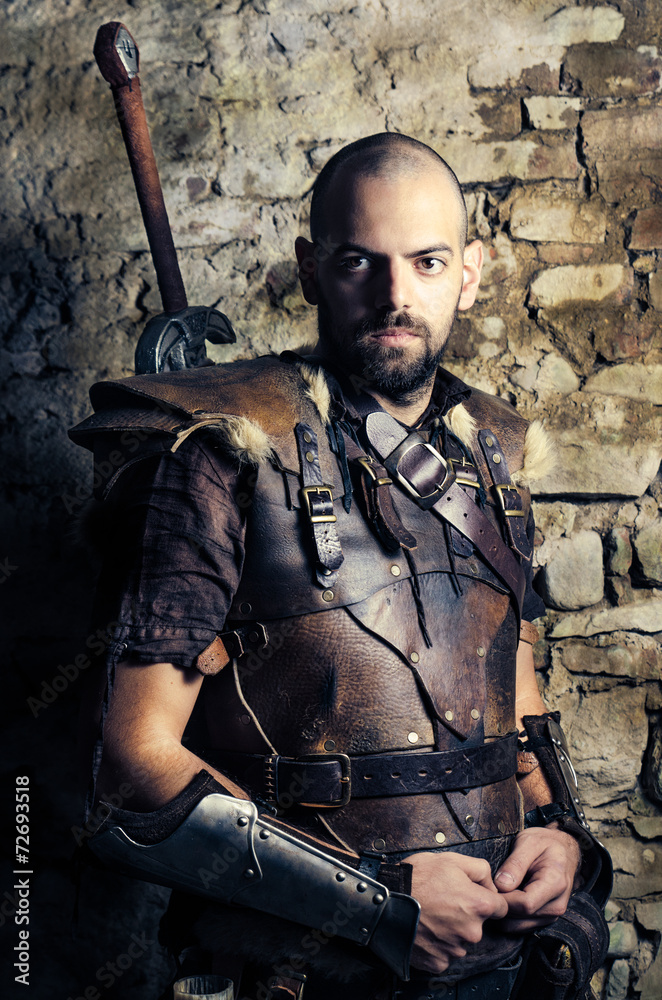 Ancient medieval warrior preparing to battle Ancient medieval warrior preparing to battle