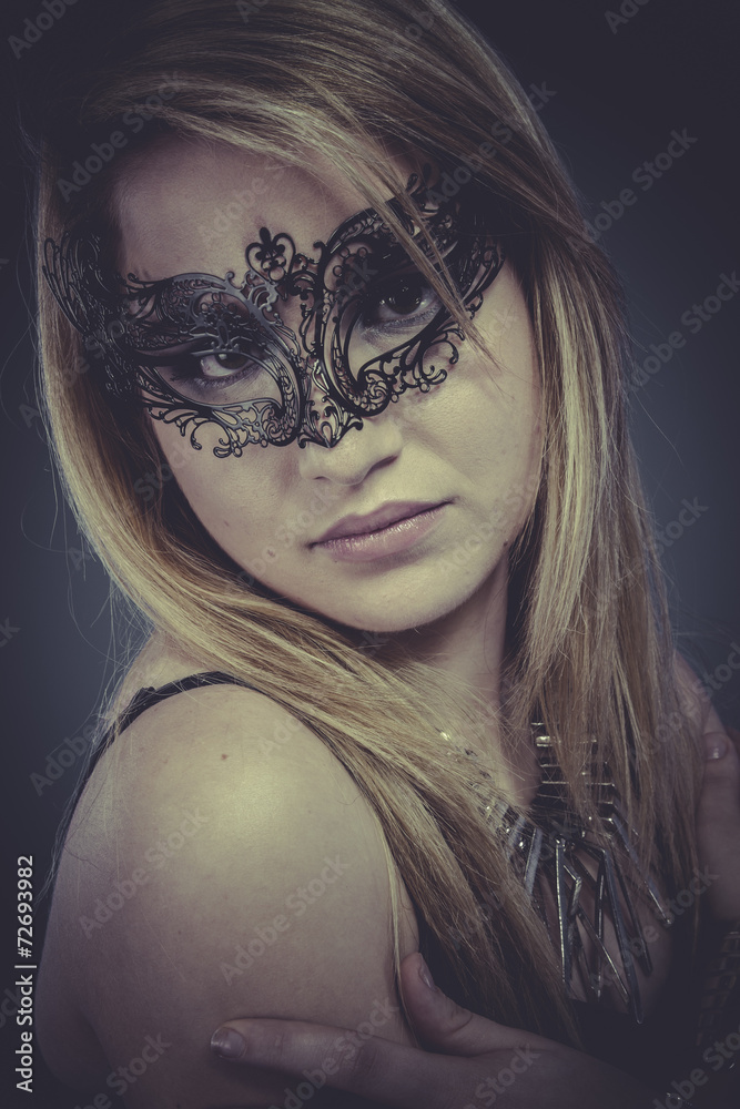 Gold, Beautiful blonde with silver jewelry and mask Gold, Beautiful blonde with silver jewelry and mask