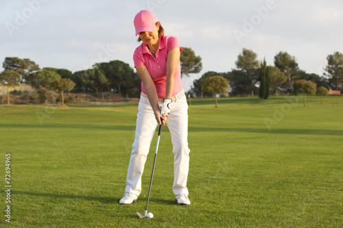 beautiful senior female golf player