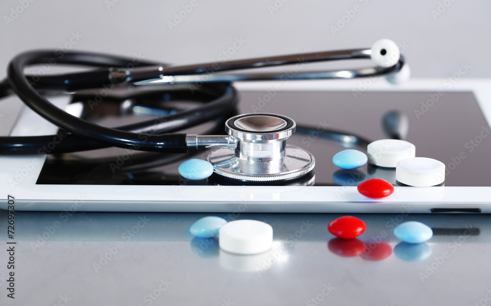 Stethoscope, pills, PC tablet Stethoscope, pills, PC tablet