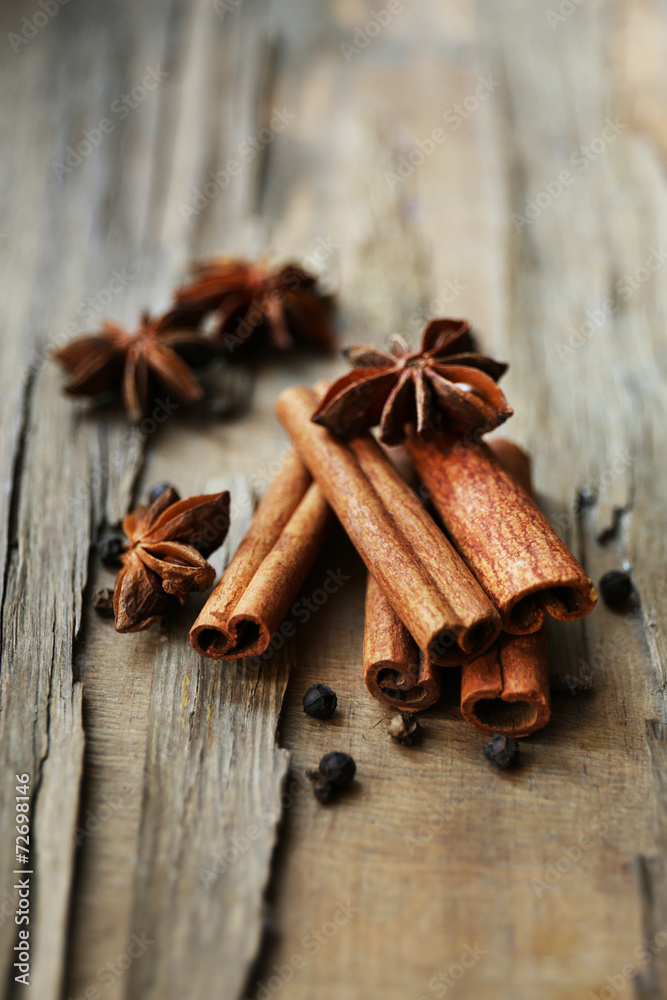 Cinnamon on wooden background, close-up Cinnamon on wooden background, close-up