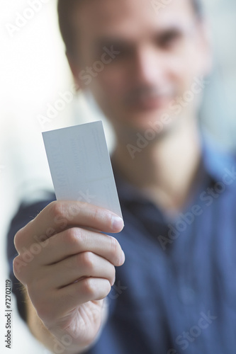 businessman giving a business card