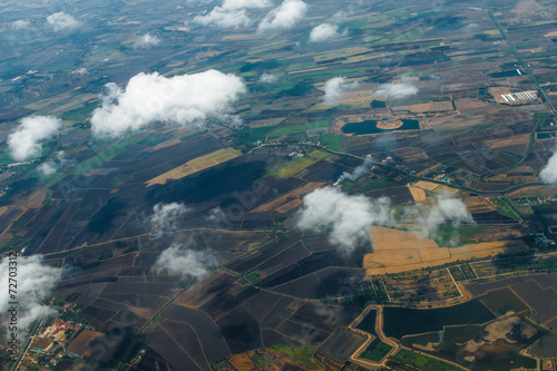 Bild auf Leinwand Aerial view of clouds and village