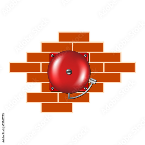 Retro alarm on the brick wall