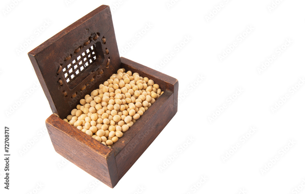 Soybean in wooden box over white background Soybean in wooden box over white background
