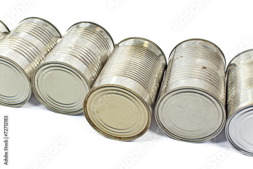 Pile of used cans over white background