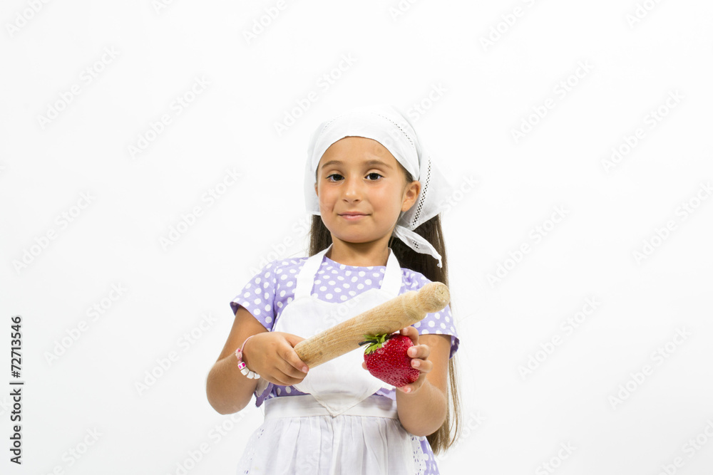 Small smiling chef with kitchen utensils and strawberry Small smiling chef with kitchen utensils and strawberry