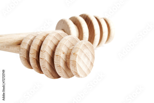 Wooden spoons for honey on a white background