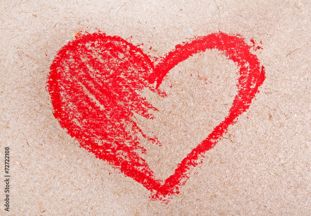 Red heart symbol on a paper with chalk Red heart symbol on a paper with chalk
