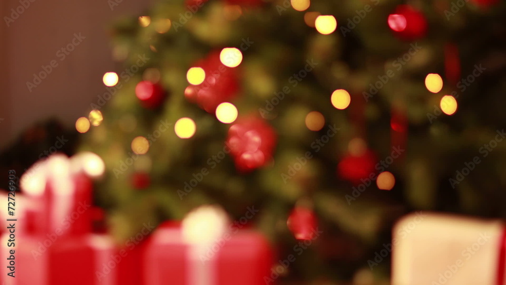 Blinking lights on christmas tree out of focus Blinking lights on christmas tree out of focus