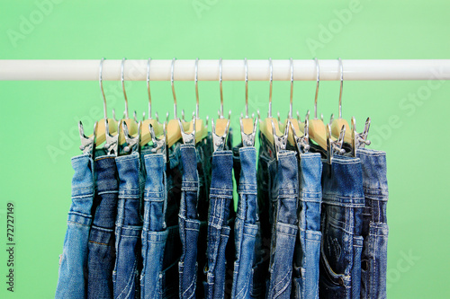 Row of hanged blue jeans