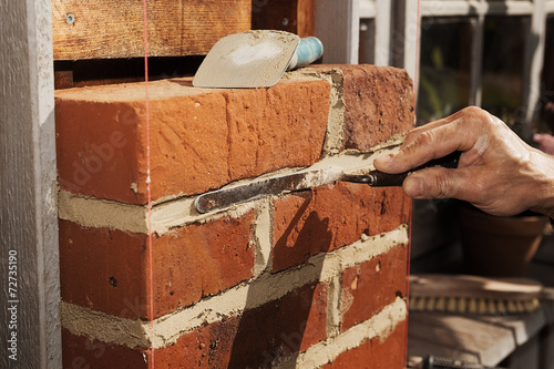 Laying bricks photo