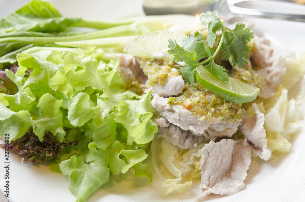 Steamed pork with spicy sauce and lemon Steamed pork with spicy sauce and lemon