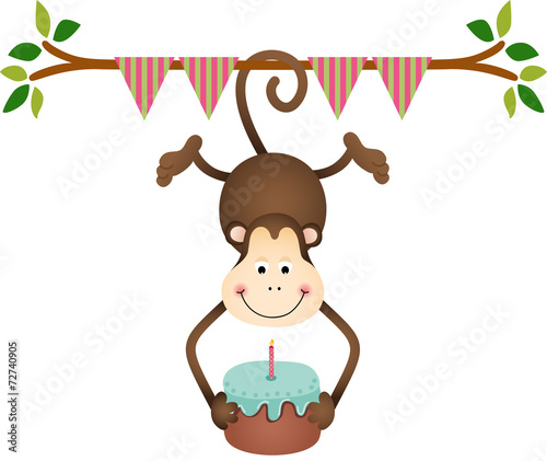 Hanging monkey holding a  birthday cake