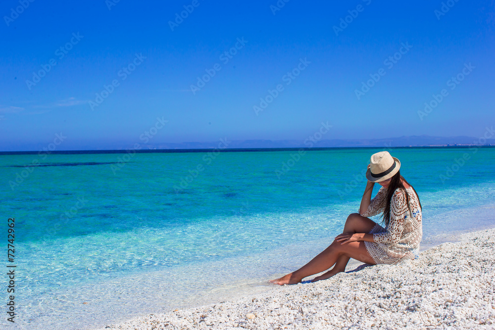 Young beautiful girl enjoying beach tropical vacation Young beautiful girl enjoying beach tropical vacation