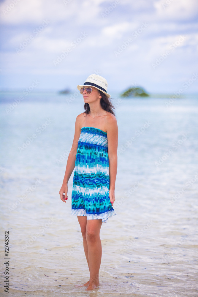 Young beautiful woman during beach vacation