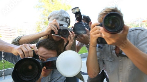 Group of paparazzi people taking picture  photo