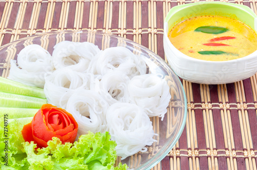 Thai rice vermicelli served with curry photo