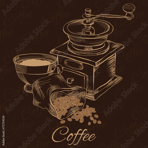 Cofee grinder with cup of coffee and beans