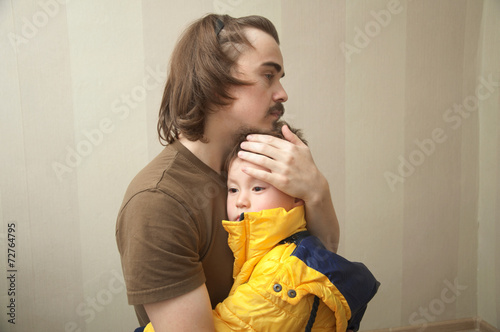Father and son hugging photo