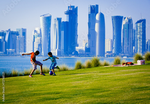 Boys playing football in Doha qatar