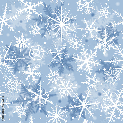 Seamless background with beautiful various snowflakes.