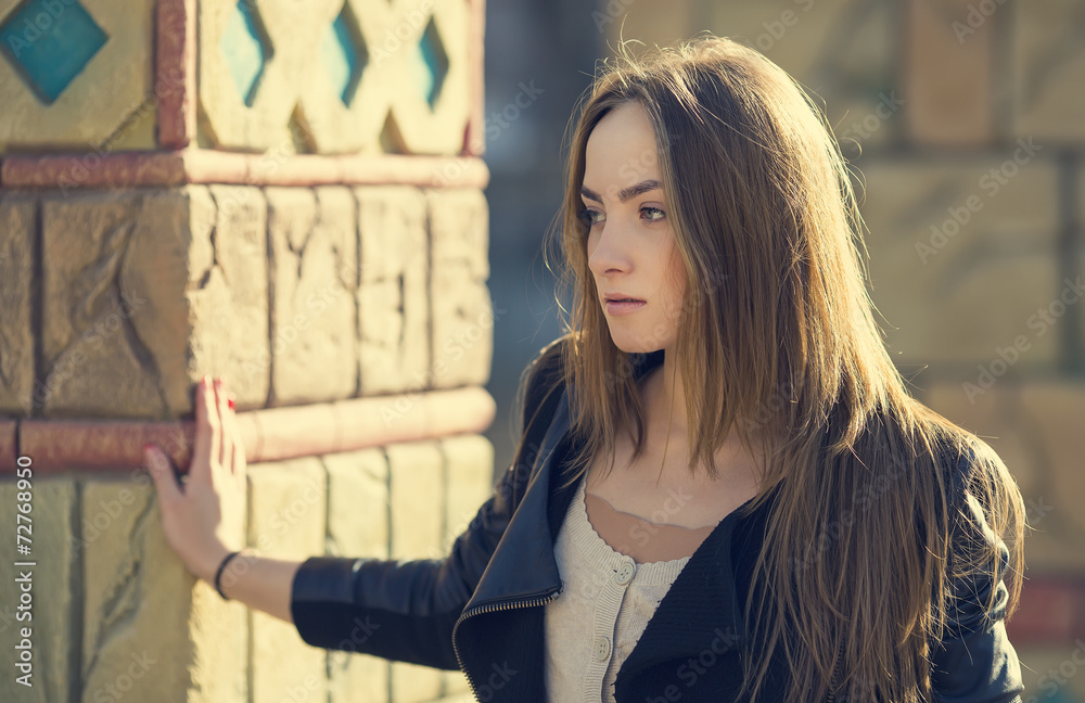 Fototapeta premium portrait of a girl in the park