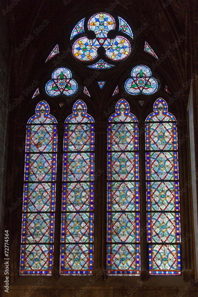 Stained glass windows inside the Notre Dame Cathedral. Paris